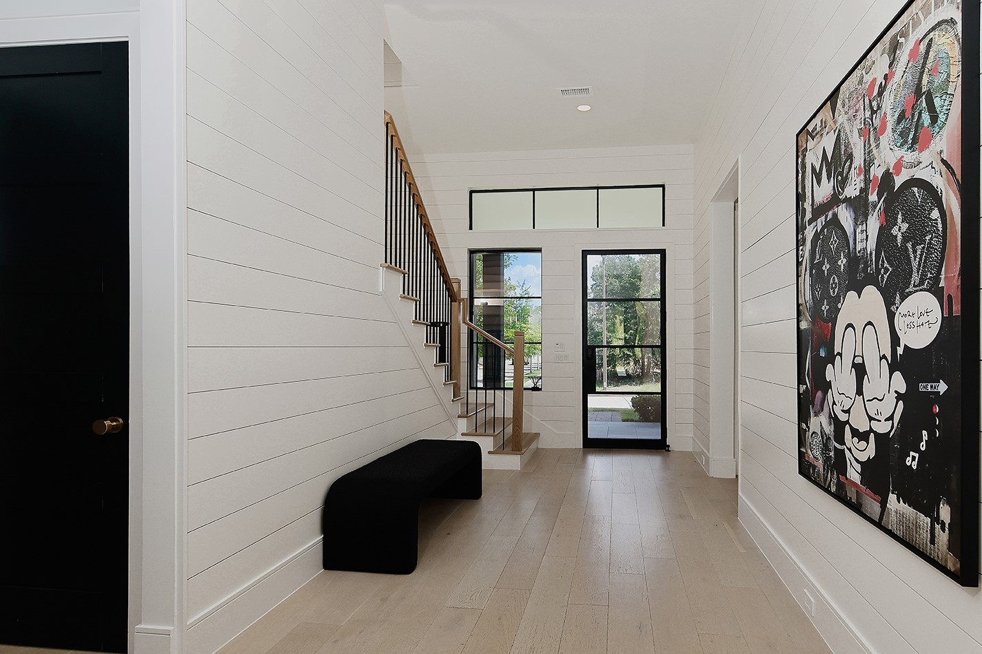 425 Copa Palm Loop Montgomery, TX 77316 - Photo 4 of 39 a view of a entryway door with wooden floor