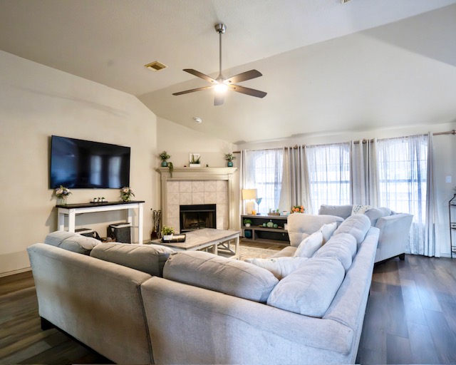 1406 Apache Cove Pflugerville, TX 78660 - Photo 15 of 40 a living room with furniture and a flat screen tv