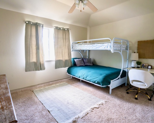 1406 Apache Cove Pflugerville, TX 78660 - Photo 31 of 40 a living room with furniture rug and window