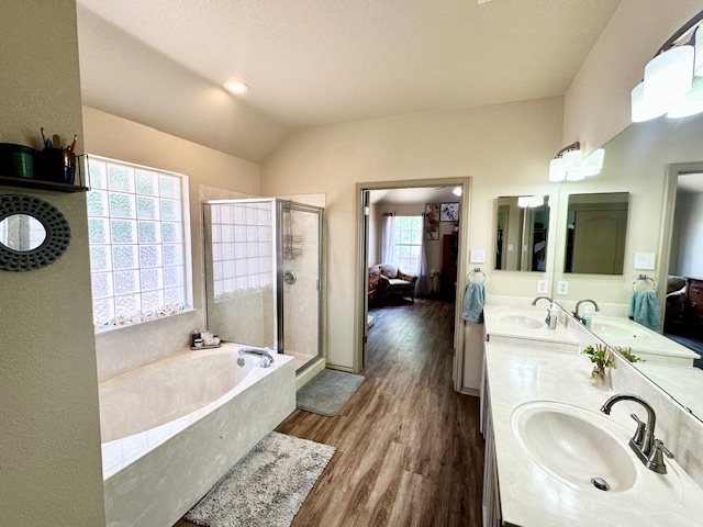 1406 Apache Cove Pflugerville, TX 78660 - Photo 33 of 40 a spacious bathroom with a tub sink and mirror