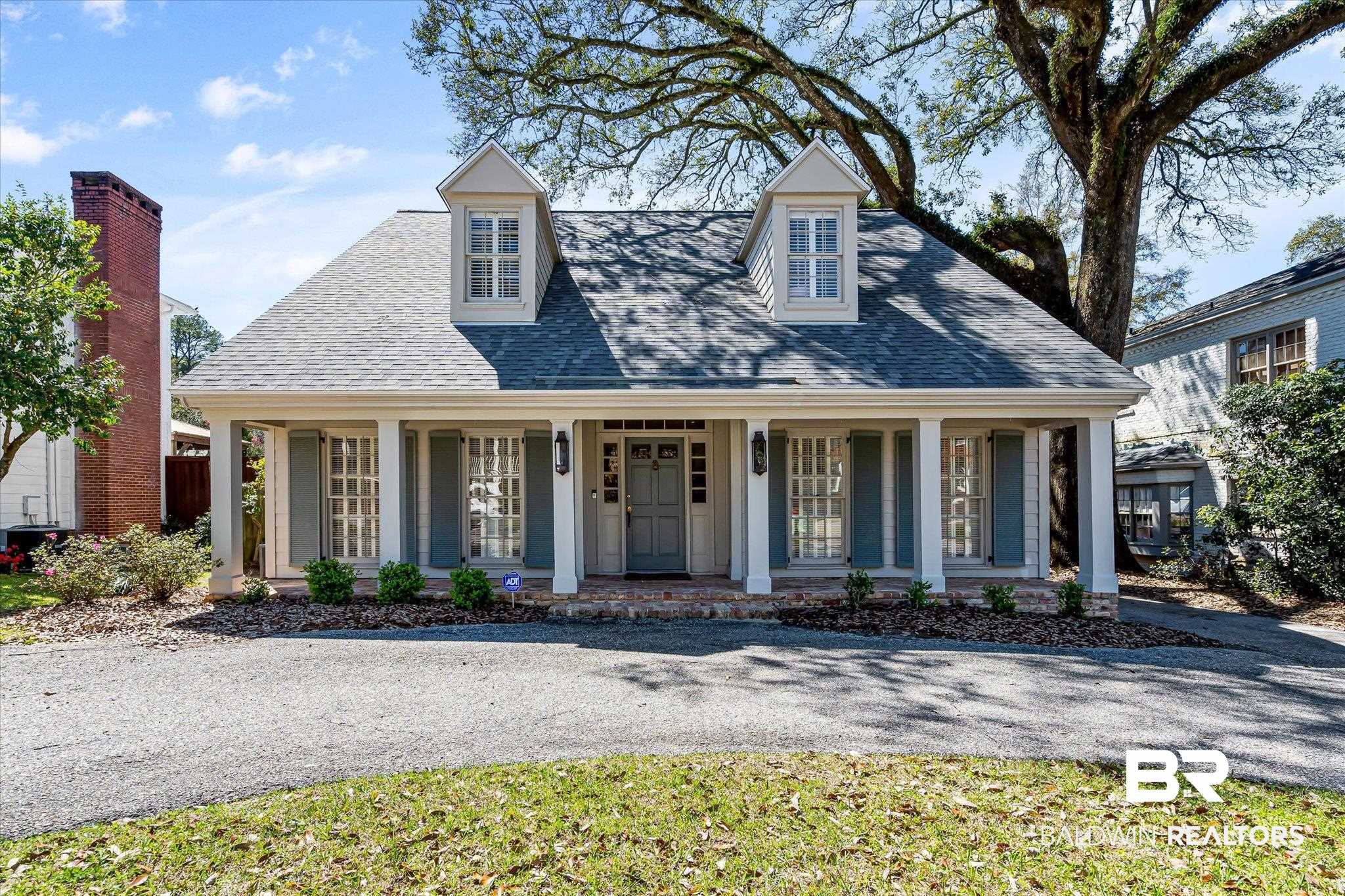 3921 McGregor Court Mobile, AL 36608 - Photo 1 of 41 View of front of property featuring covered porch and a shingled roof