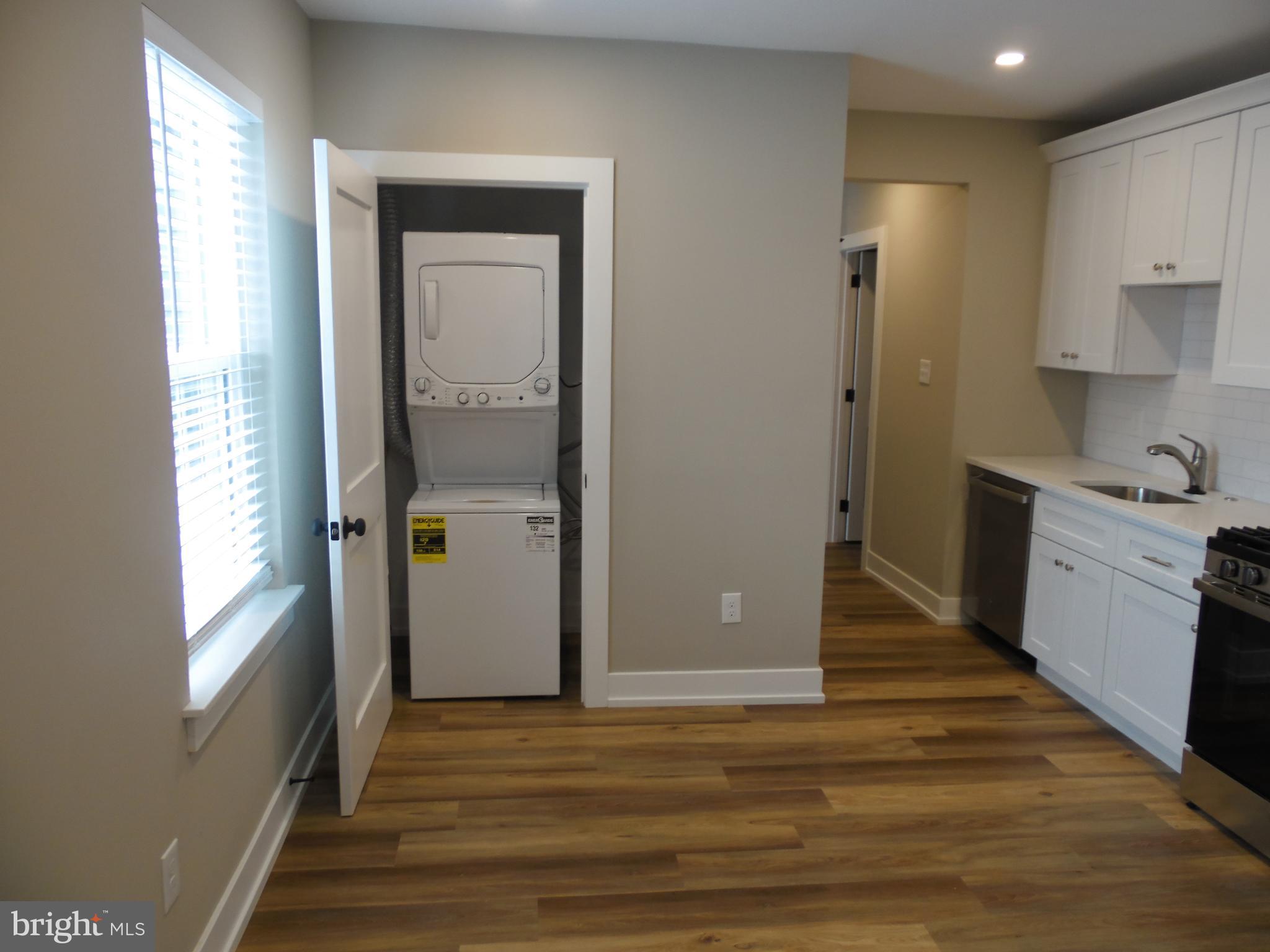 155 Channing Avenue, Unit 3 Malvern, PA 19355 - Photo 14 of 16 a view of a kitchen from the hallway