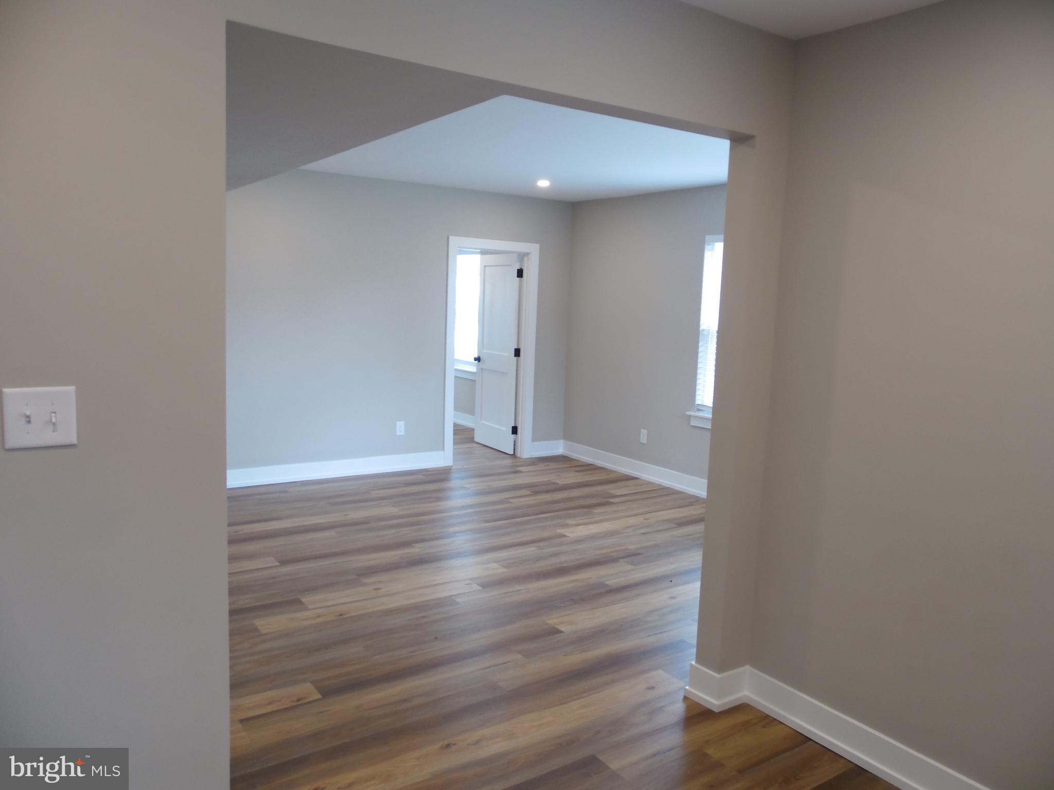 155 Channing Avenue, Unit 3 Malvern, PA 19355 - Photo 15 of 16 a view of a hallway with wooden floor