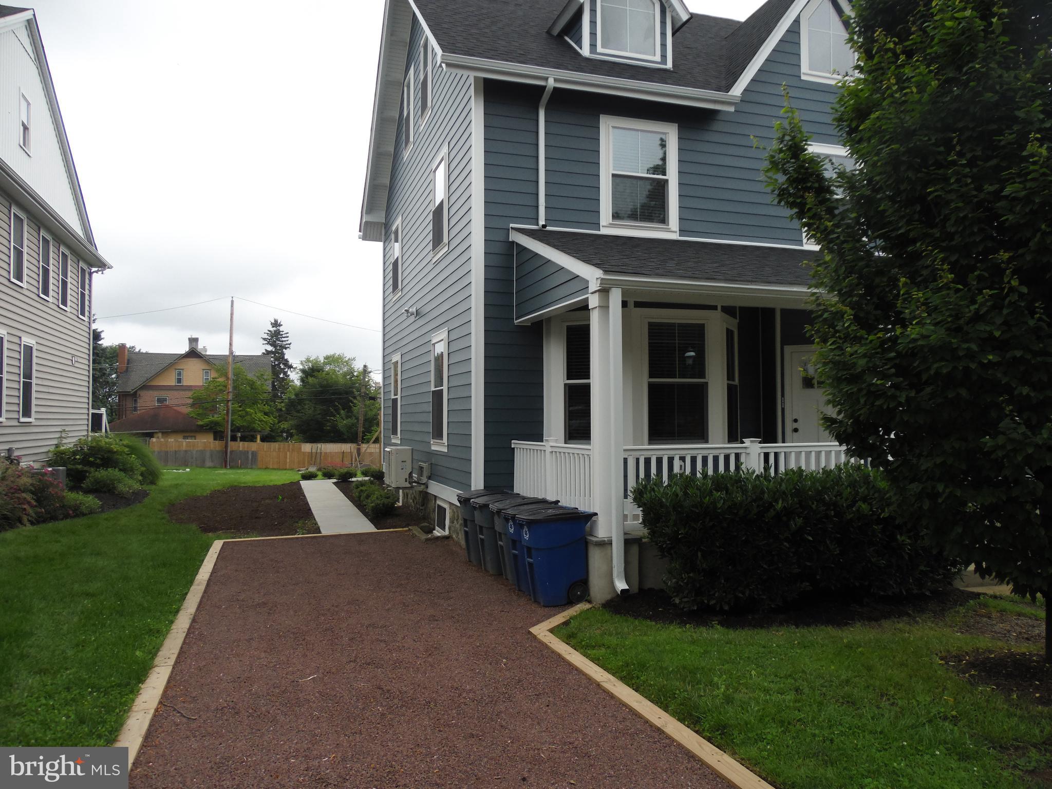 155 Channing Avenue, Unit 3 Malvern, PA 19355 - Photo 16 of 16 a view of a house with backyard and garden