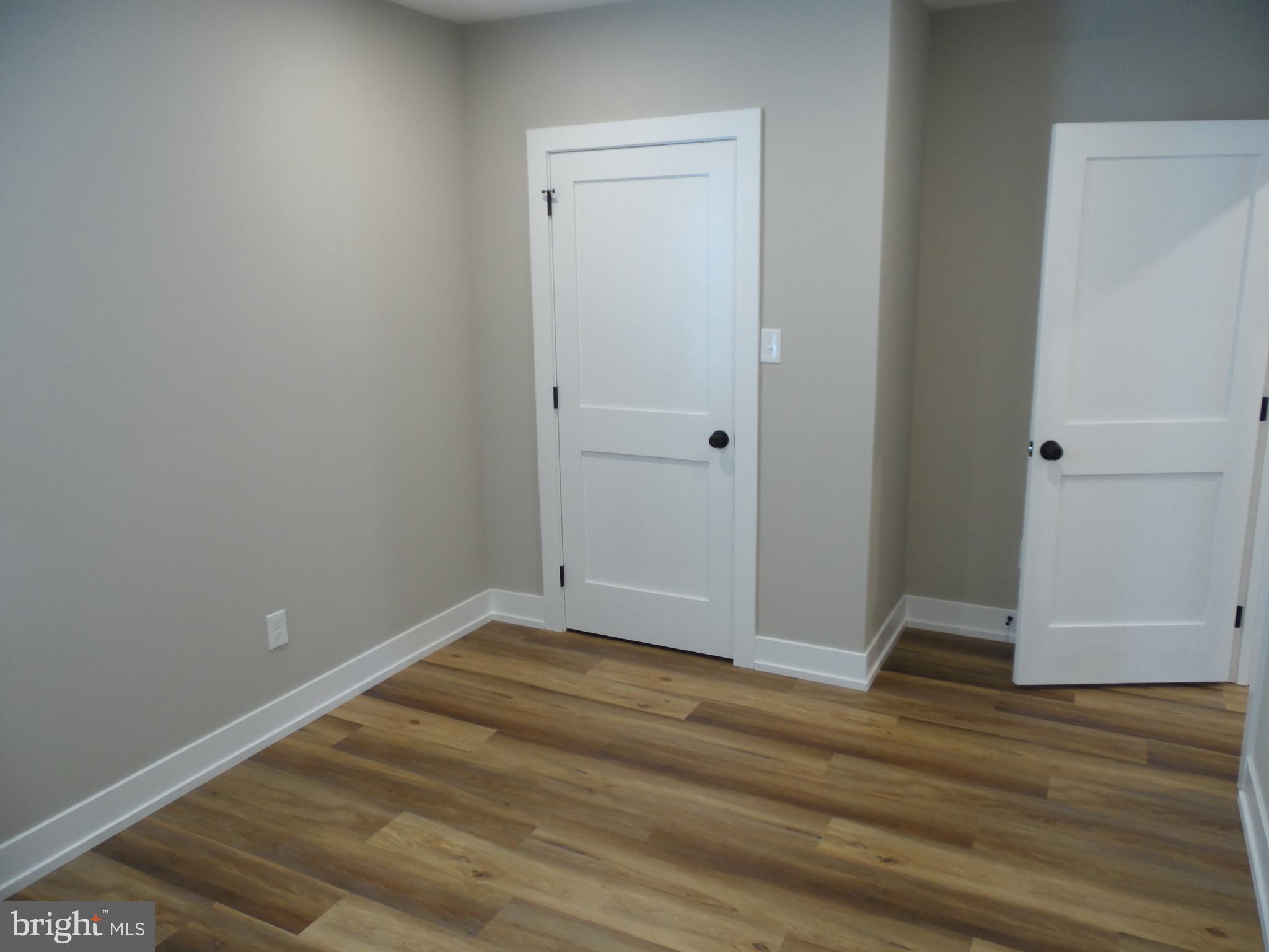 155 Channing Avenue, Unit 3 Malvern, PA 19355 - Photo 7 of 16 a view of room with wooden floor