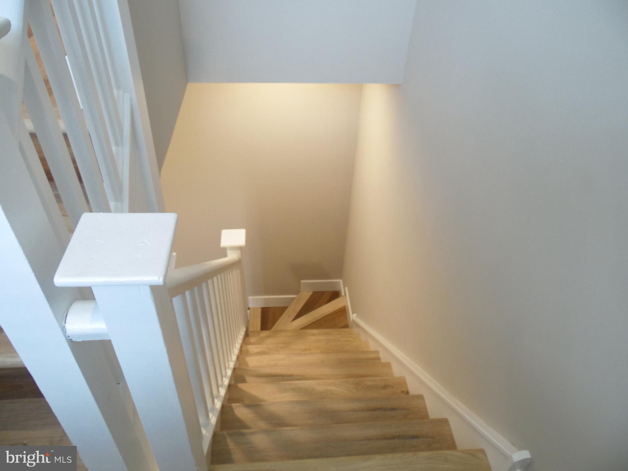 155 Channing Avenue, Unit 3 Malvern, PA 19355 - Photo 8 of 16 a view of a hallway view with staircase