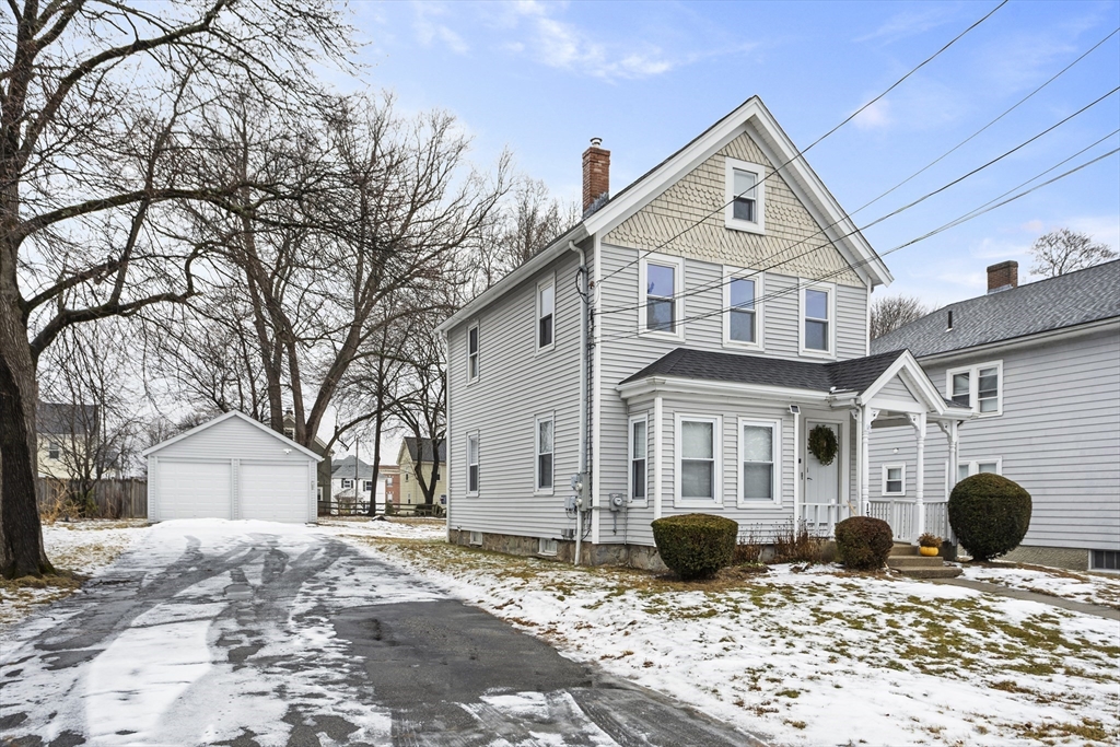 135 Cottage Street, Unit 2 Norwood, MA 02062 - Photo 2 of 30 a front view of a house with parking space