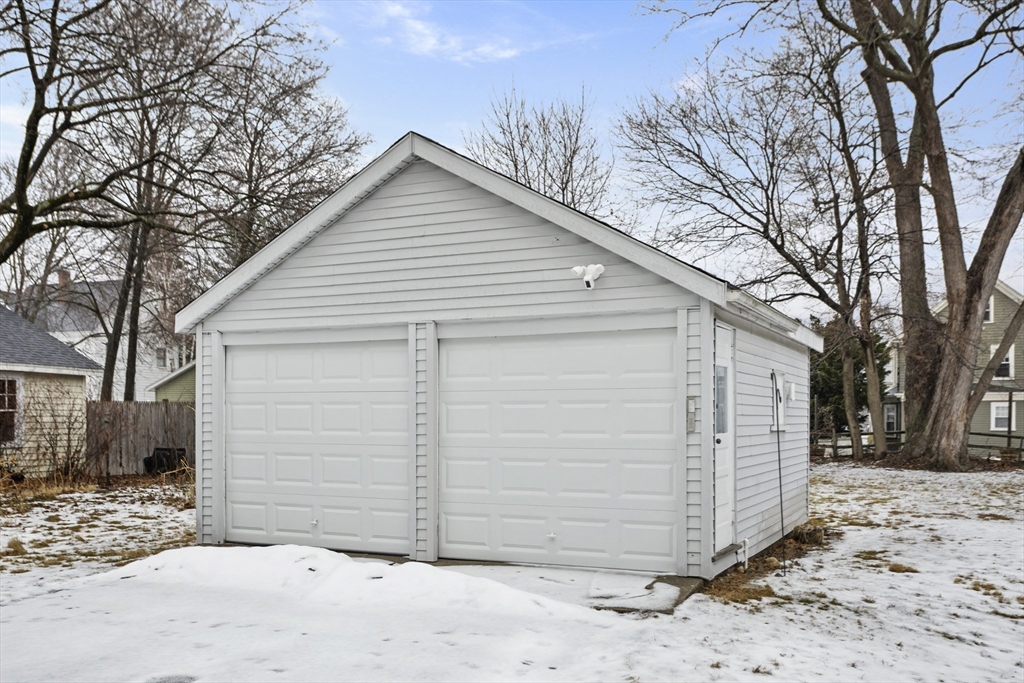 135 Cottage Street, Unit 2 Norwood, MA 02062 - Photo 26 of 30 a view of a house with a yard
