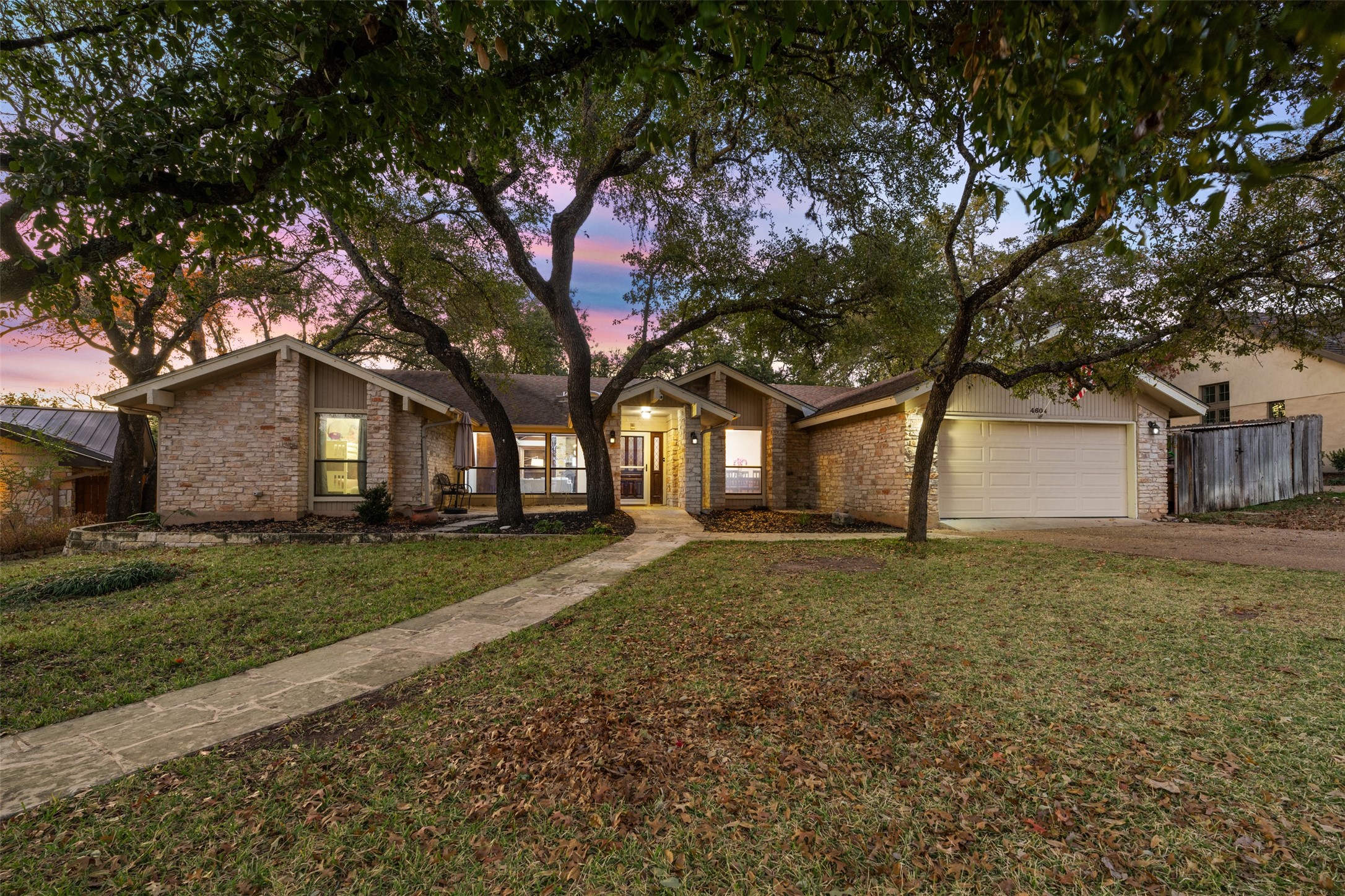 4604 Creek Ridge Austin, TX 78735 - Photo 1 of 1 Ranch-style house with a garage and a yard