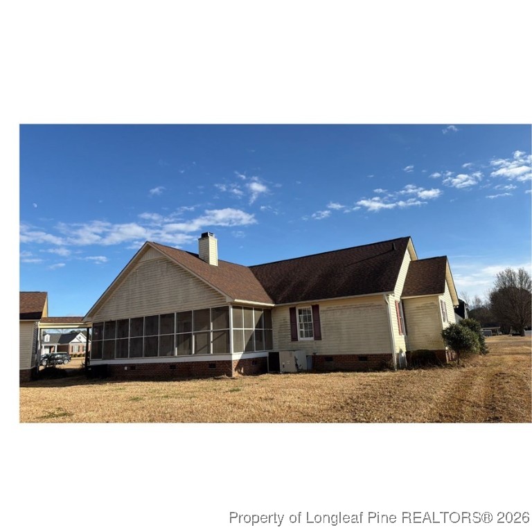 47 Hidden Cove Lane Clinton, NC 28328 - Photo 2 of 10 a front view of a house with a yard
