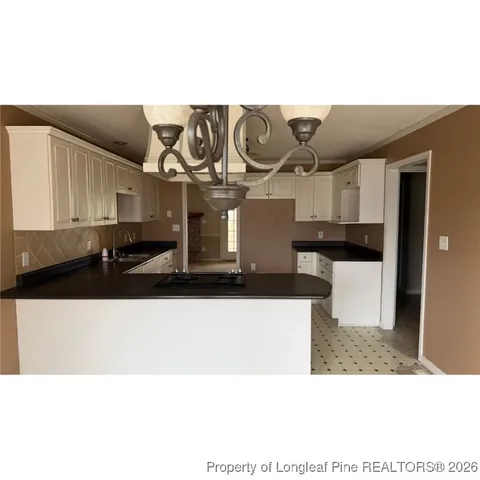 a black and white photo of a living room