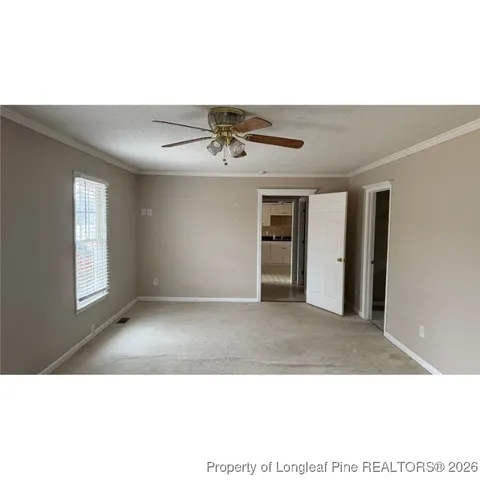 a view of an empty room and window