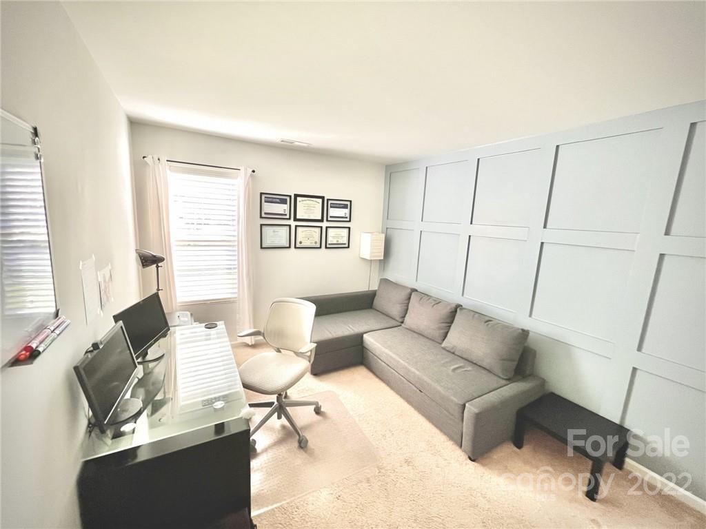 7402 Cedarfield Road Charlotte, NC 28227 - Photo 11 of 15 a living room with furniture and a couch