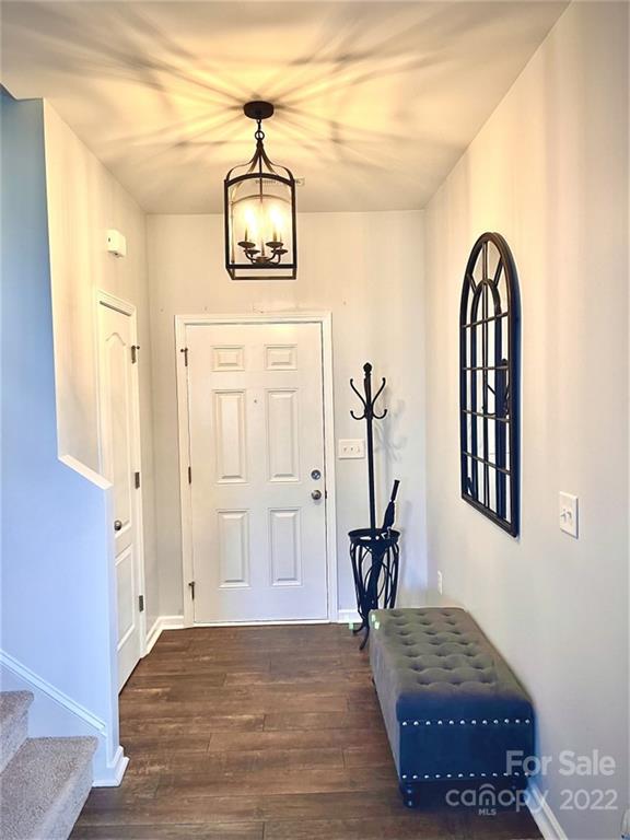 7402 Cedarfield Road Charlotte, NC 28227 - Photo 2 of 15 a view of hall way with furniture and entryway