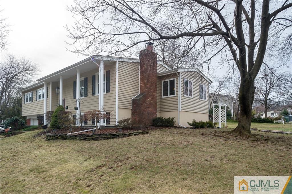 69 Wilk Road Edison, NJ 08837 - Photo 17 of 19 a view of a house with a yard