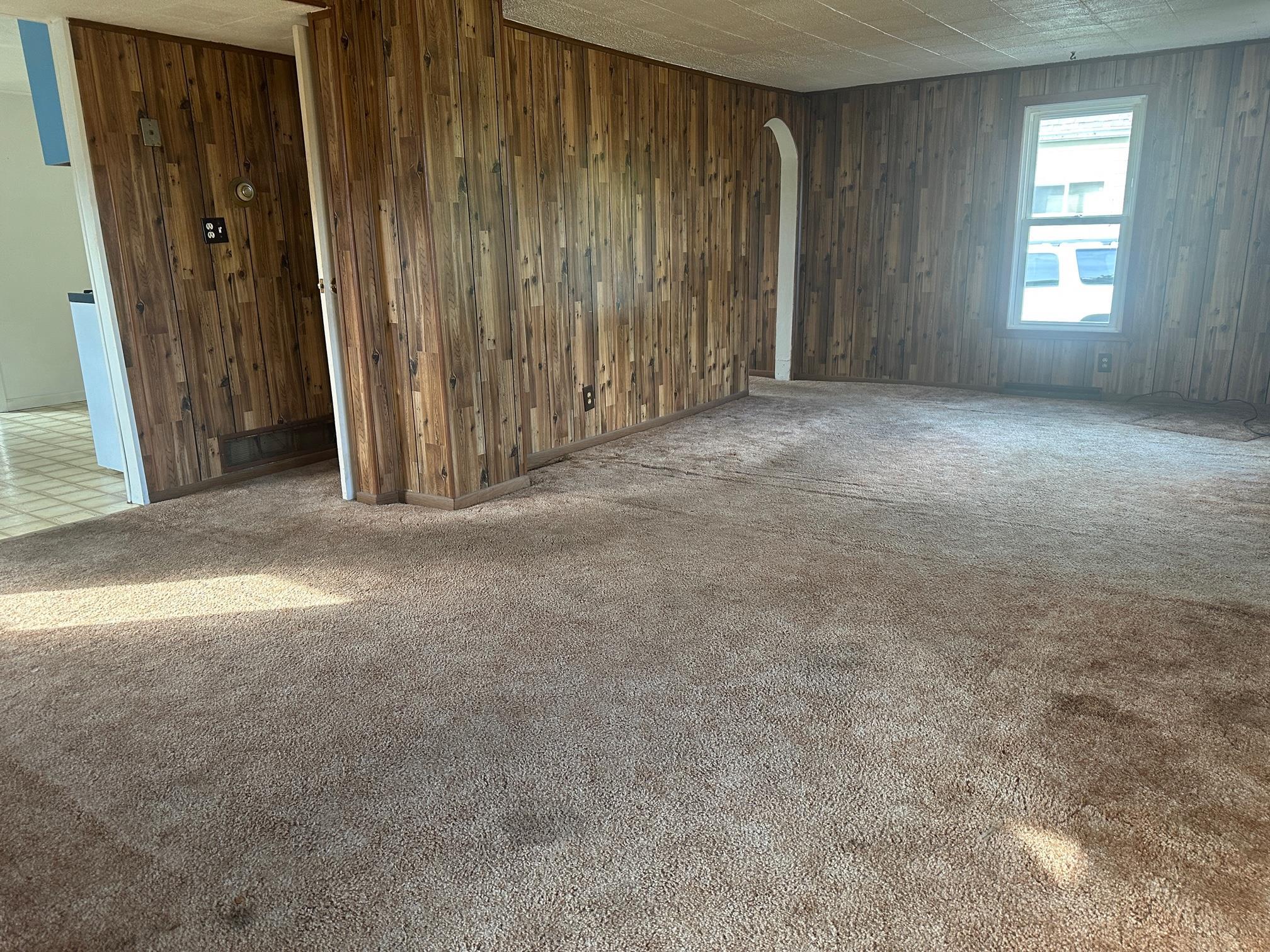 6 Garfield Road Harvard, IL 60033 - Photo 6 of 14 a view of a livingroom with a fireplace