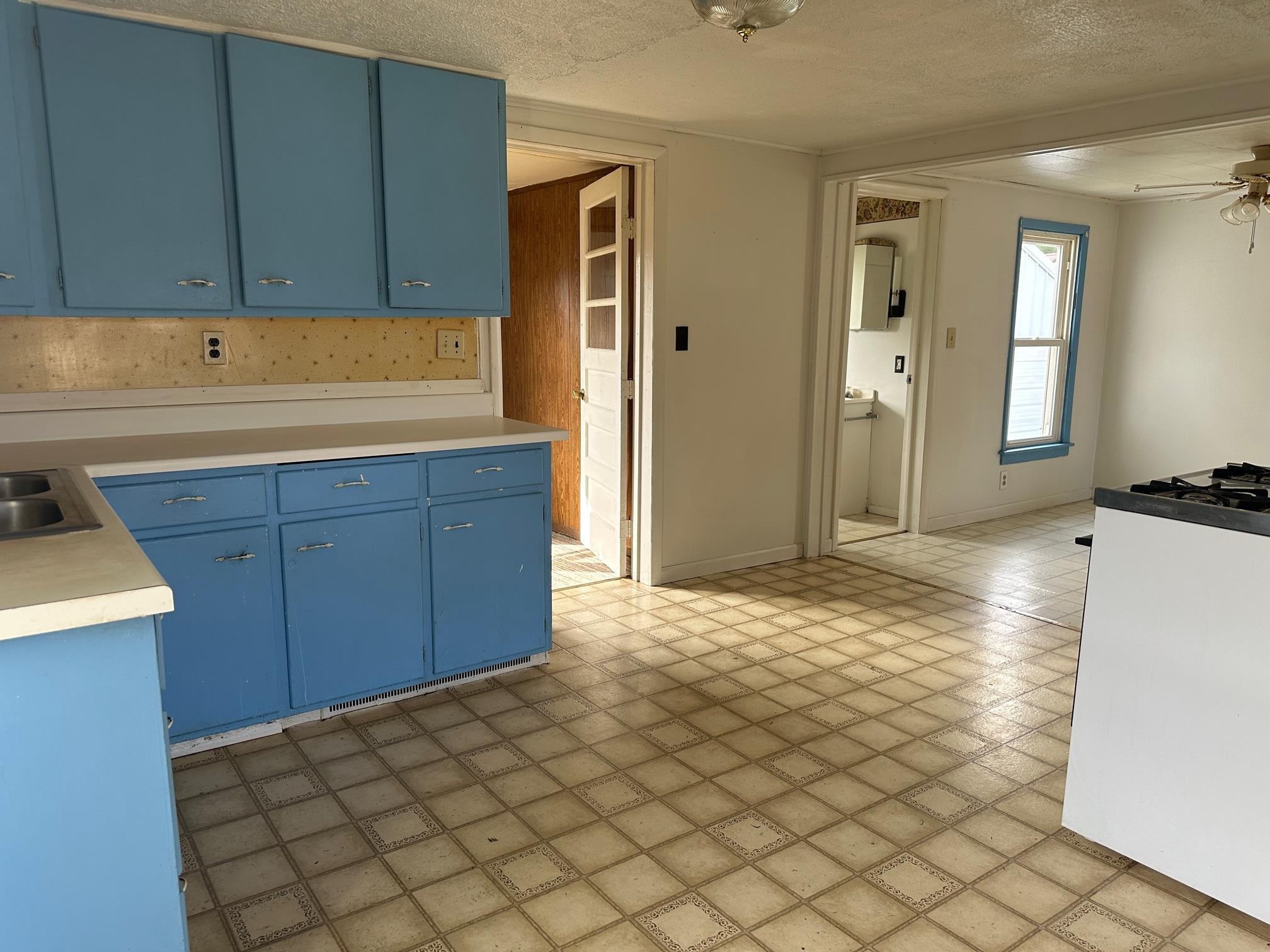 6 Garfield Road Harvard, IL 60033 - Photo 8 of 14 a kitchen with a sink and cabinets