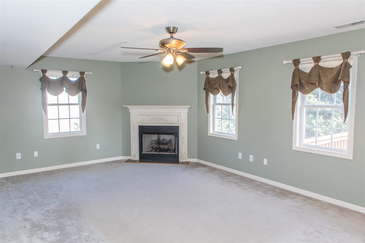 58 Long Bow Road Waynesboro, VA 22980 - Photo 14 of 42 a view of livingroom with window fireplace and fan
