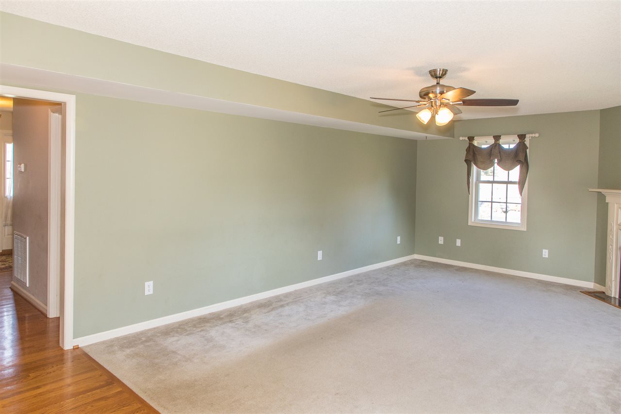 58 Long Bow Road Waynesboro, VA 22980 - Photo 15 of 42 wooden floor in an empty room with a window