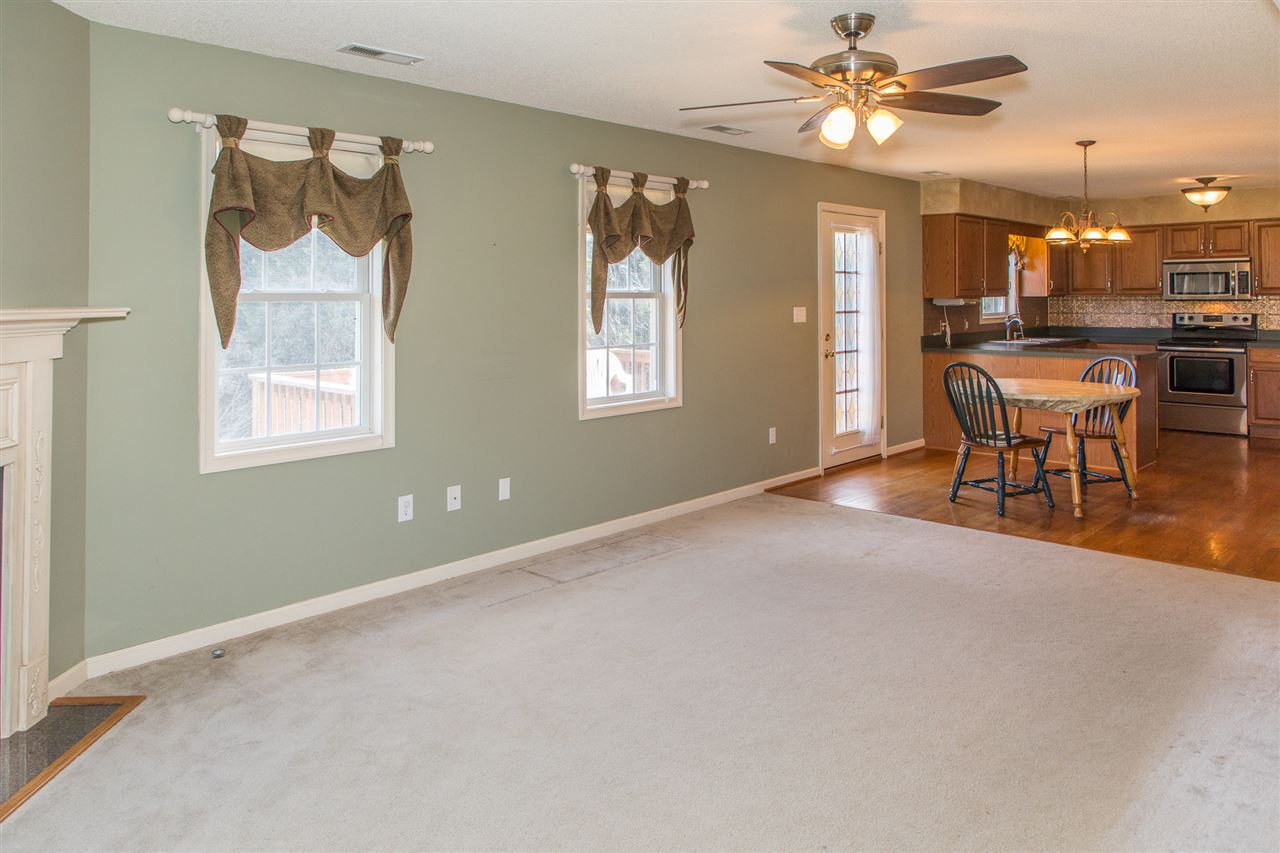 58 Long Bow Road Waynesboro, VA 22980 - Photo 16 of 42 a view of a dining room with furniture window and wooden floor