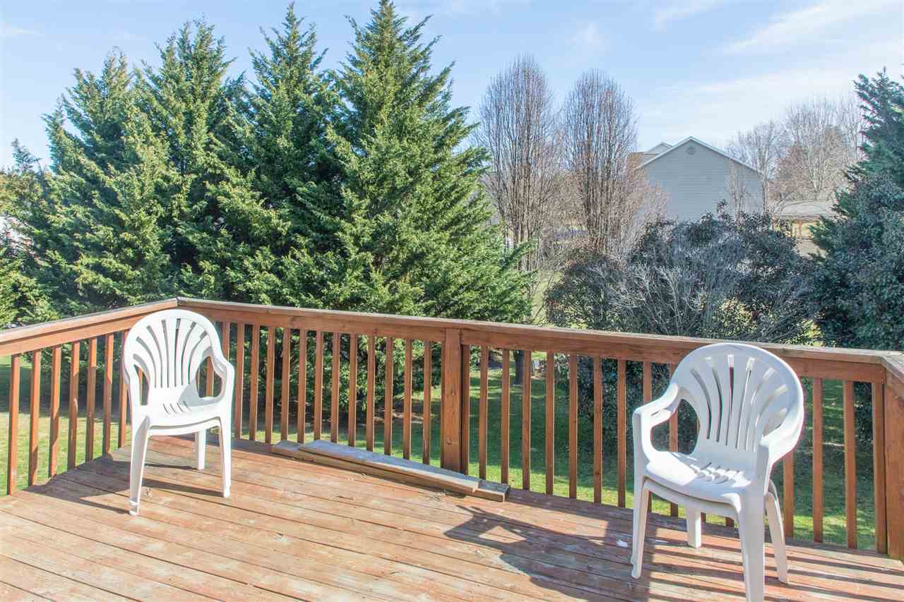 58 Long Bow Road Waynesboro, VA 22980 - Photo 26 of 42 a view of a wooden chairs and bench in the balcony