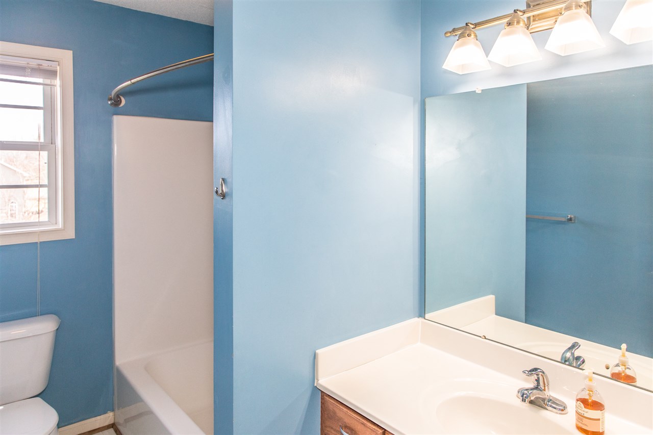 58 Long Bow Road Waynesboro, VA 22980 - Photo 29 of 42 a bathroom with a sink a toilet and window