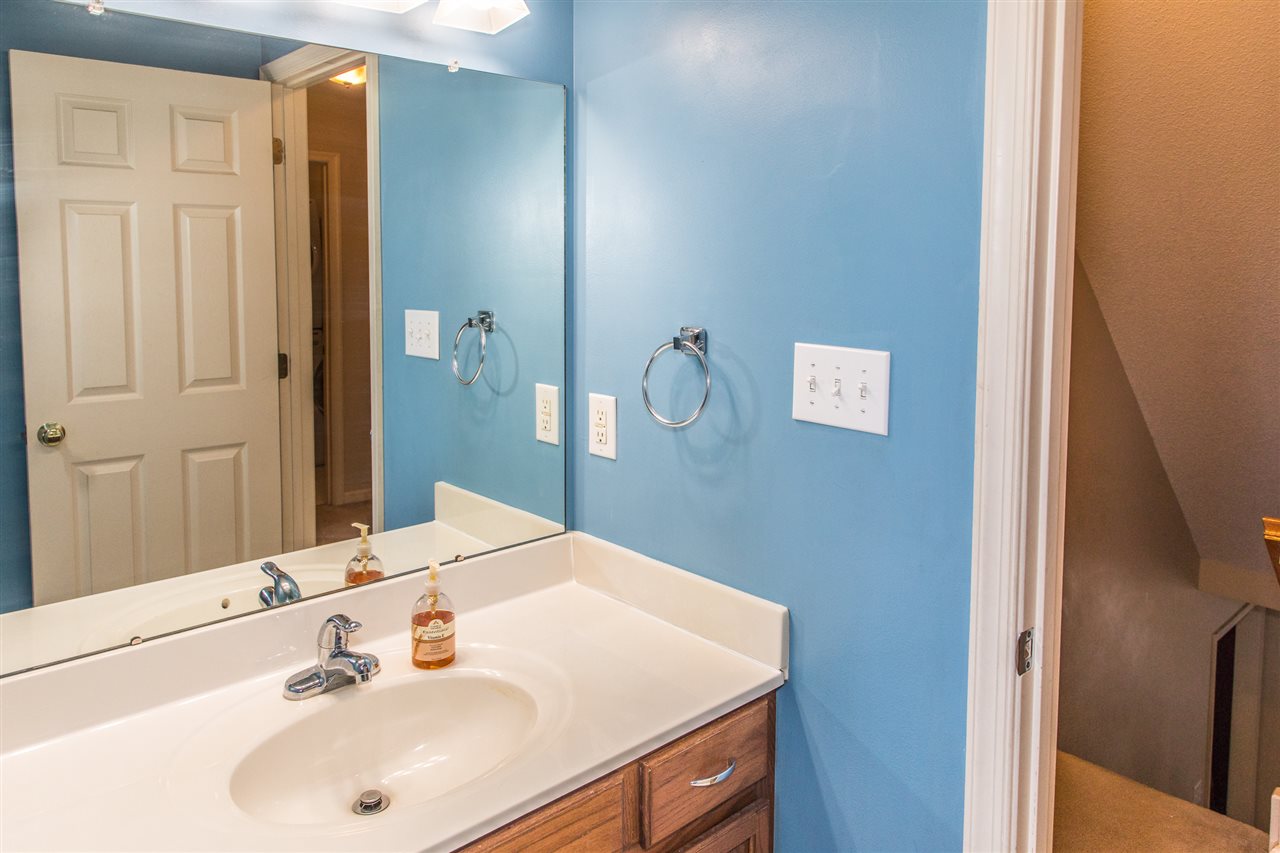58 Long Bow Road Waynesboro, VA 22980 - Photo 30 of 42 a bathroom with a sink and a mirror