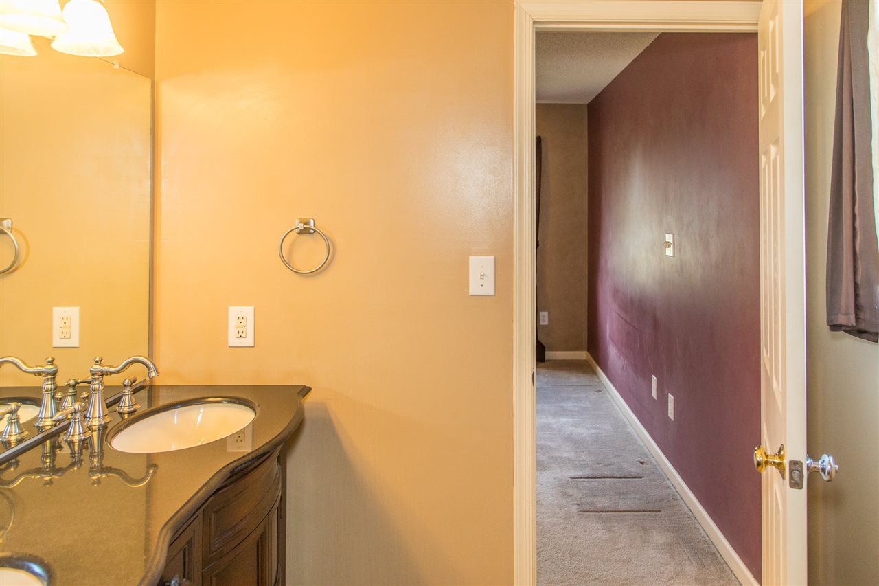 58 Long Bow Road Waynesboro, VA 22980 - Photo 36 of 42 a bathroom with a sink and a mirror