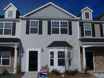 206 Pilot Court Knightdale, NC 27545 - Photo 1 of 5 a front view of a house with a yard