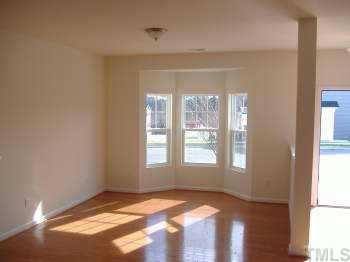 206 Pilot Court Knightdale, NC 27545 - Photo 4 of 5 a view of an empty room and window