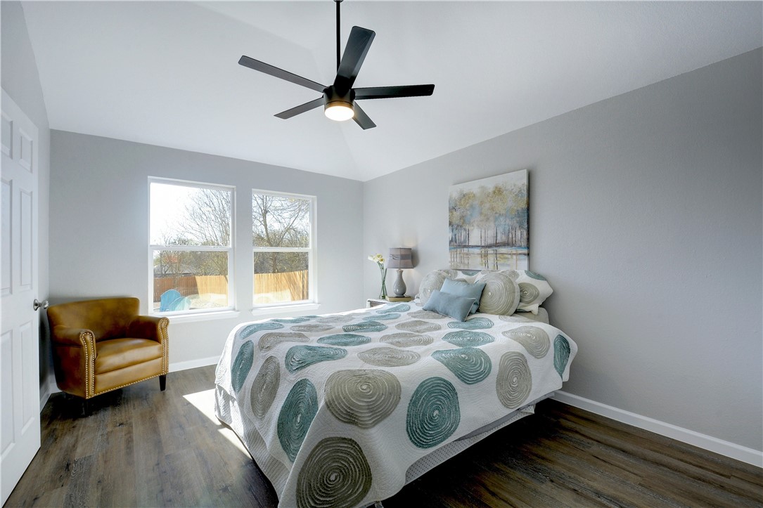 2303 Patsy Parkway Austin, TX 78744 - Photo 1 of 1 a bedroom with a bed and window