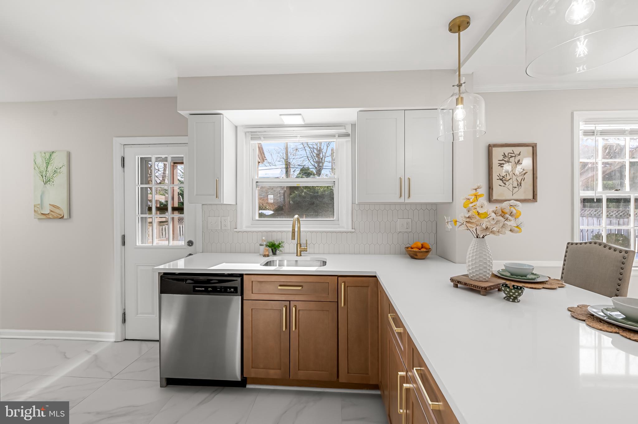 517 Worcester Road Towson, MD 21286 - Photo 14 of 44 Kitchen opening to and overlooking the backyard