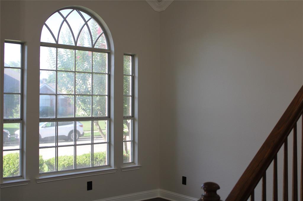 8905 Lakepointe Avenue Rowlett, TX 75088 - Photo 17 of 27 Empty room featuring baseboards
