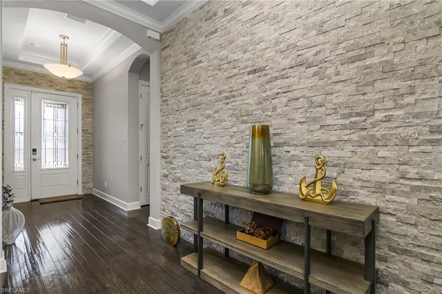 a view of entryway with wooden floor