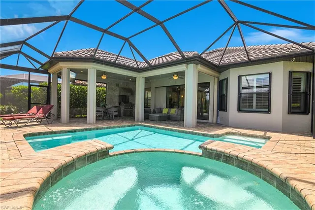a view of a house with backyard porch and patio