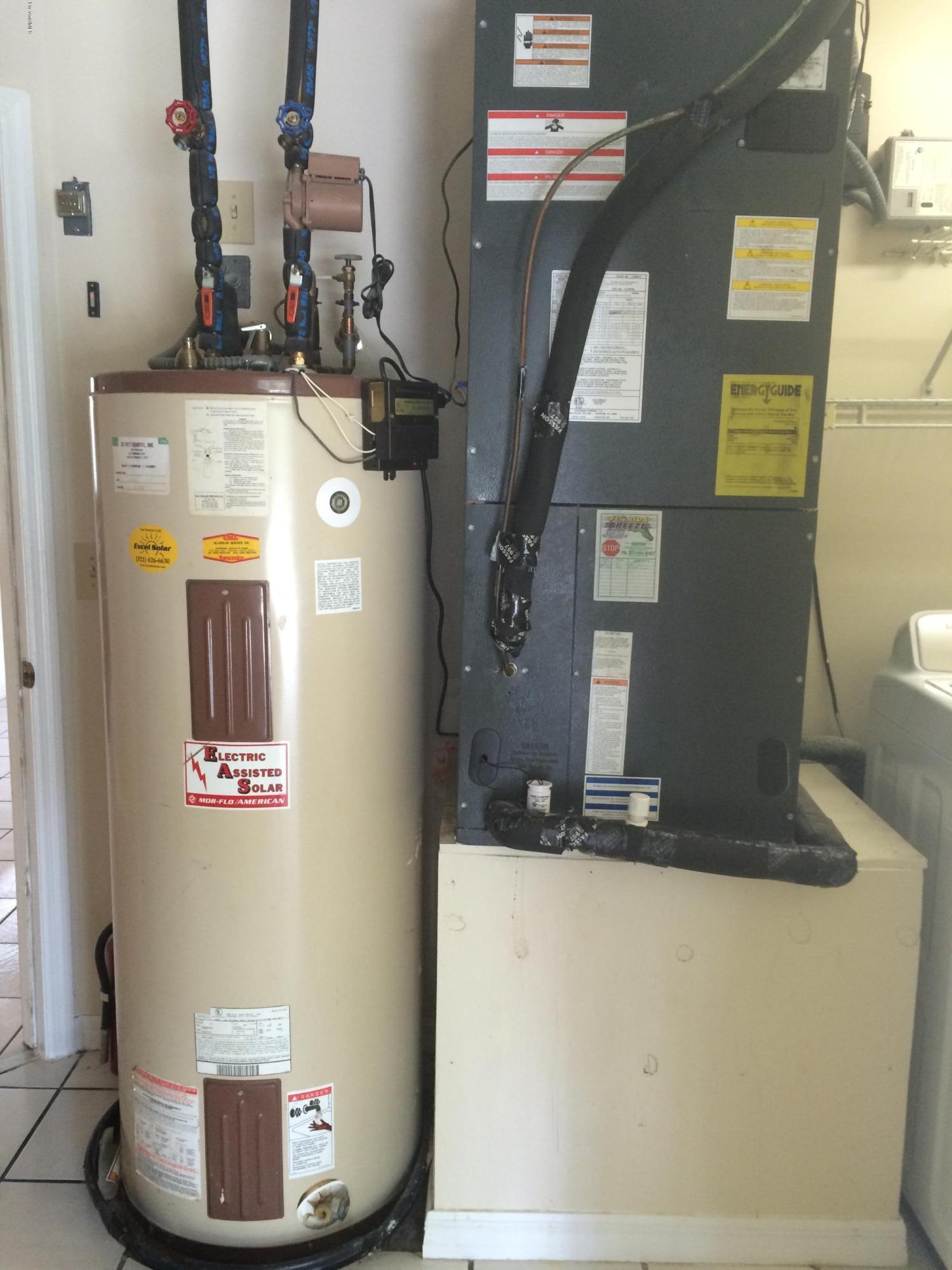 1749 Tharp Road Palm Bay, FL 32909 - Photo 31 of 34 Hot Water Tank/Furnace