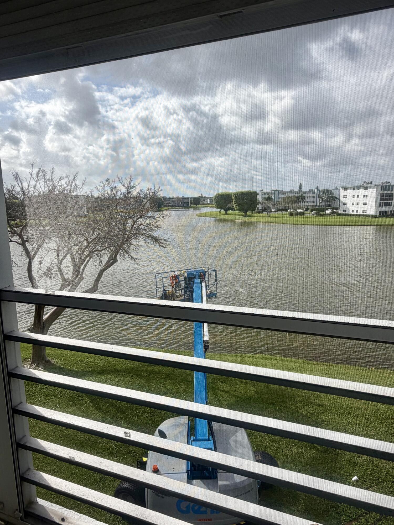 3035 Rexford A Boca Raton, FL 33434 - Photo 8 of 8 a view of a lake from a balcony