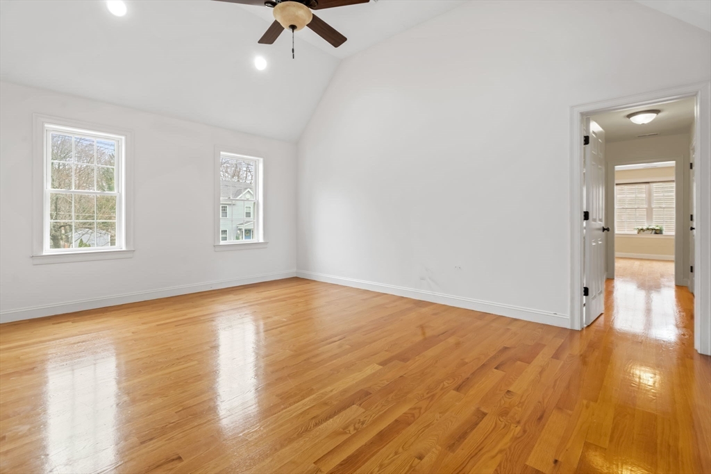 30 Neponset Street Walpole, MA 02071 - Photo 24 of 41 an empty room with wooden floor and windows