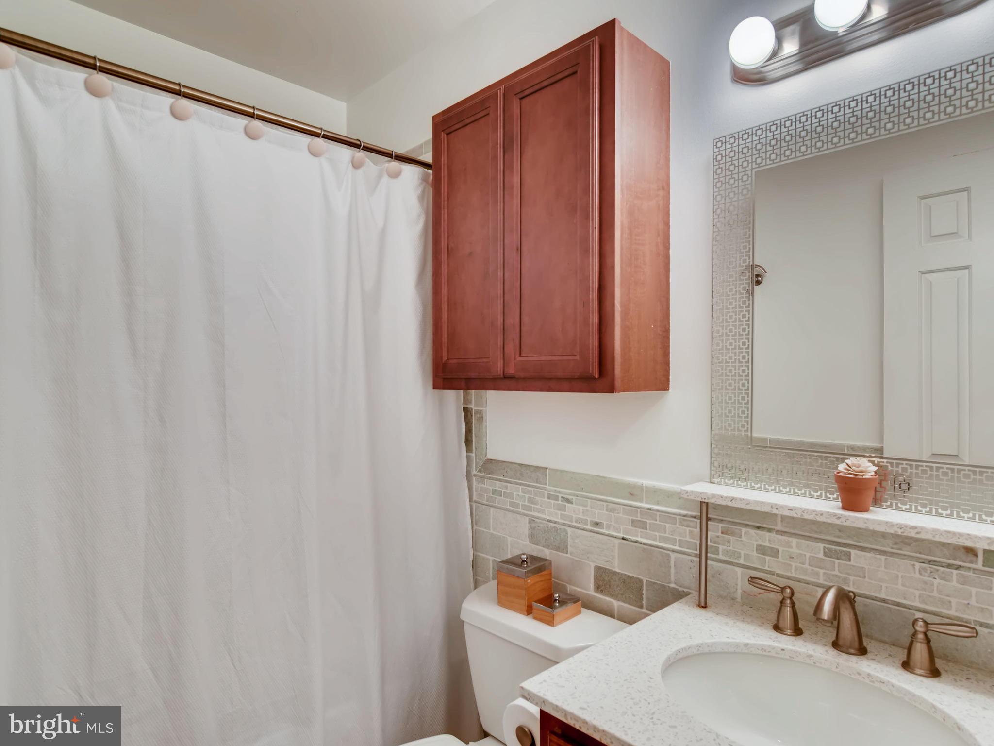 5703 Linton Road Sykesville, MD 21784 - Photo 33 of 51 Upper Level Hall Bathroom with Tub & Shower