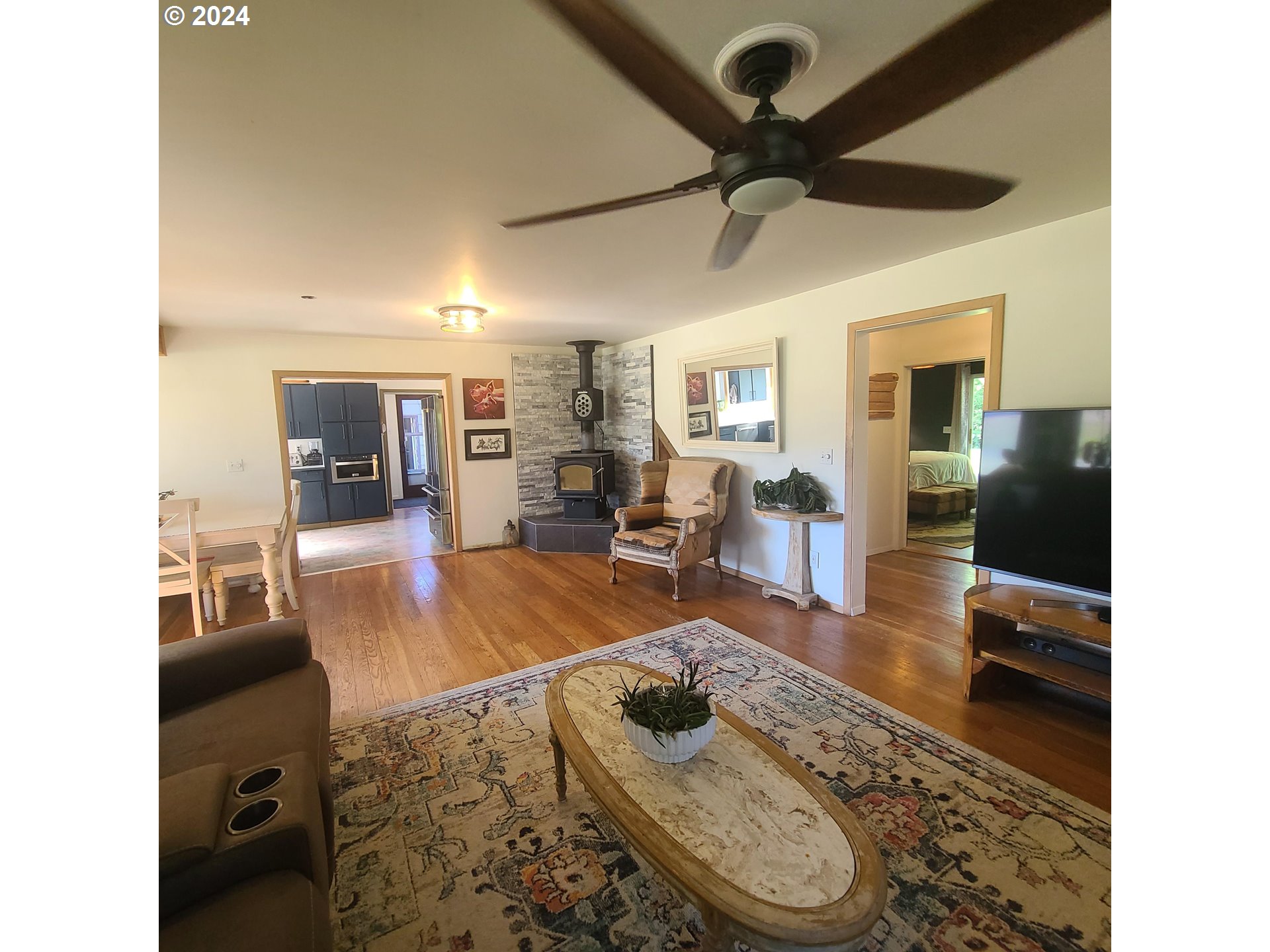 69867 Summerville Road Summerville, OR 97876 - Photo 11 of 48 a living room with furniture and a wooden floor