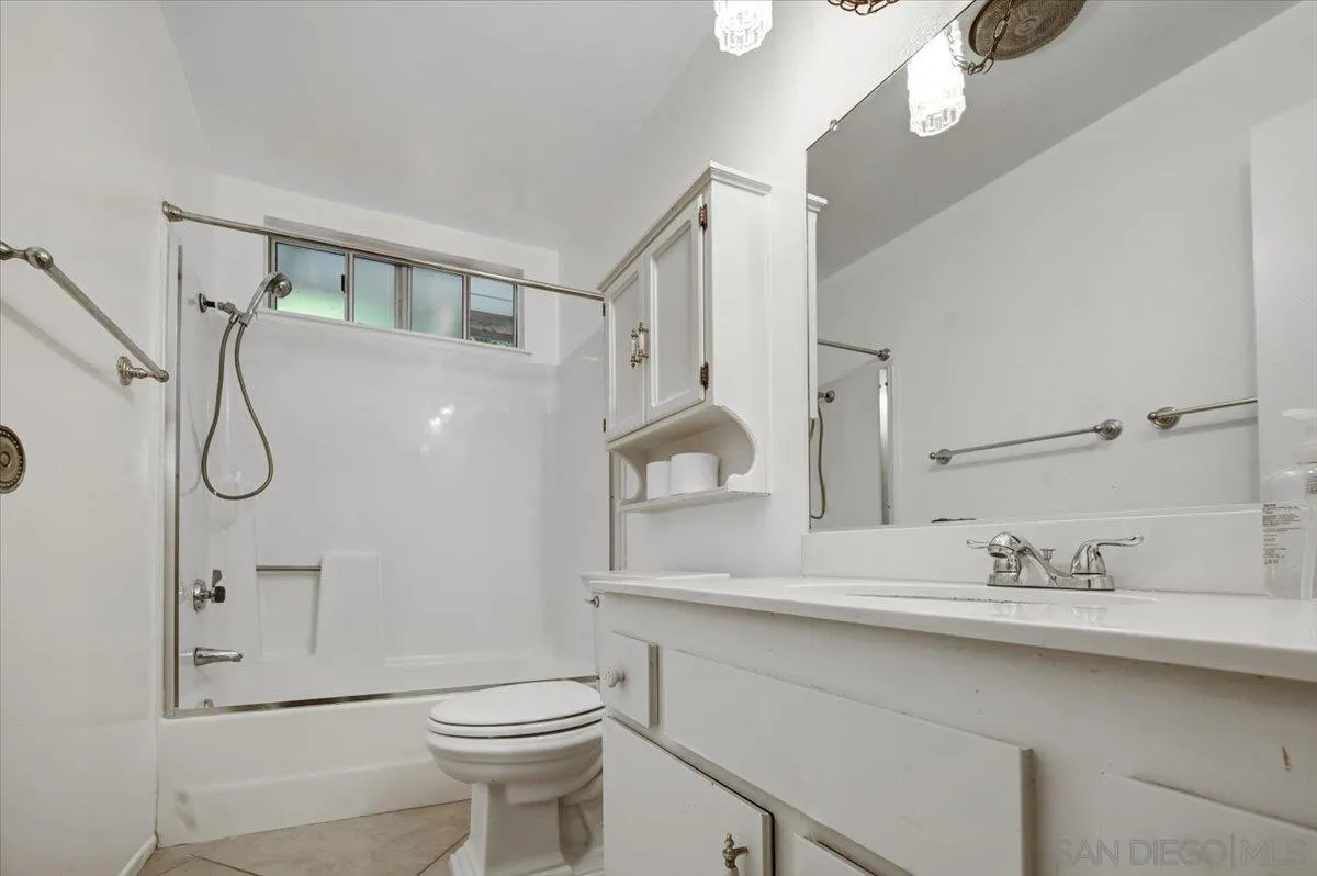 27335 Ventan Street Menifee, CA 92586 - Photo 30 of 36 a bathroom with a sink a toilet and shower