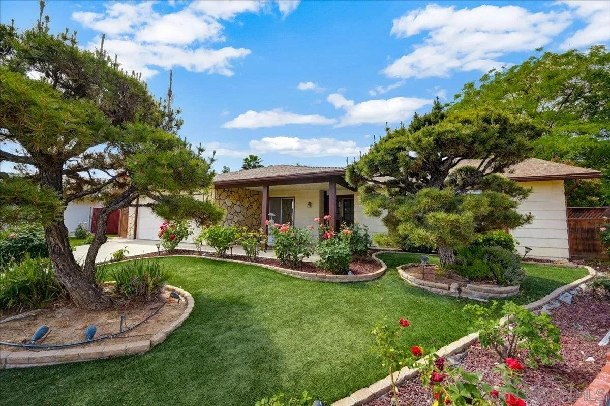 27335 Ventan Street Menifee, CA 92586 - Photo 3 of 36 a view of a house with backyard sitting area and garden
