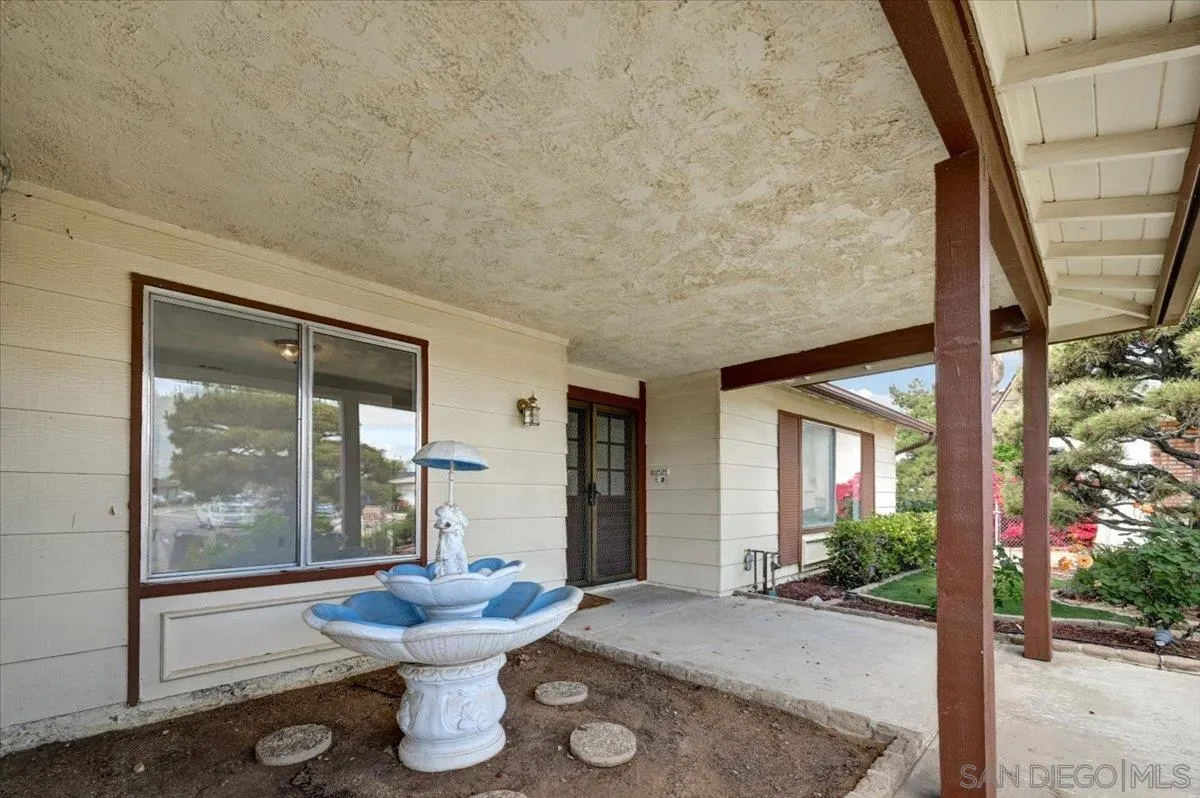 27335 Ventan Street Menifee, CA 92586 - Photo 4 of 36 a bathroom with a sink mirror toilet and glass door