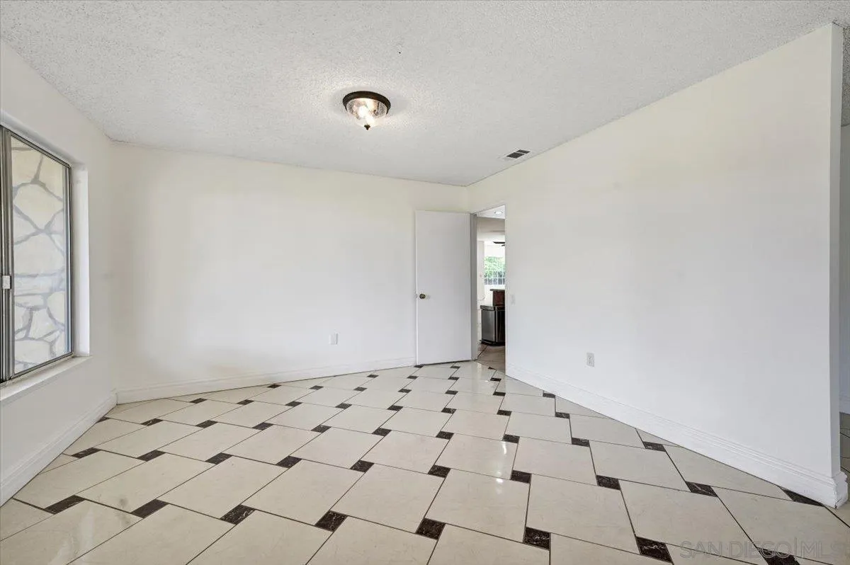 27335 Ventan Street Menifee, CA 92586 - Photo 8 of 36 a bathroom with white walls