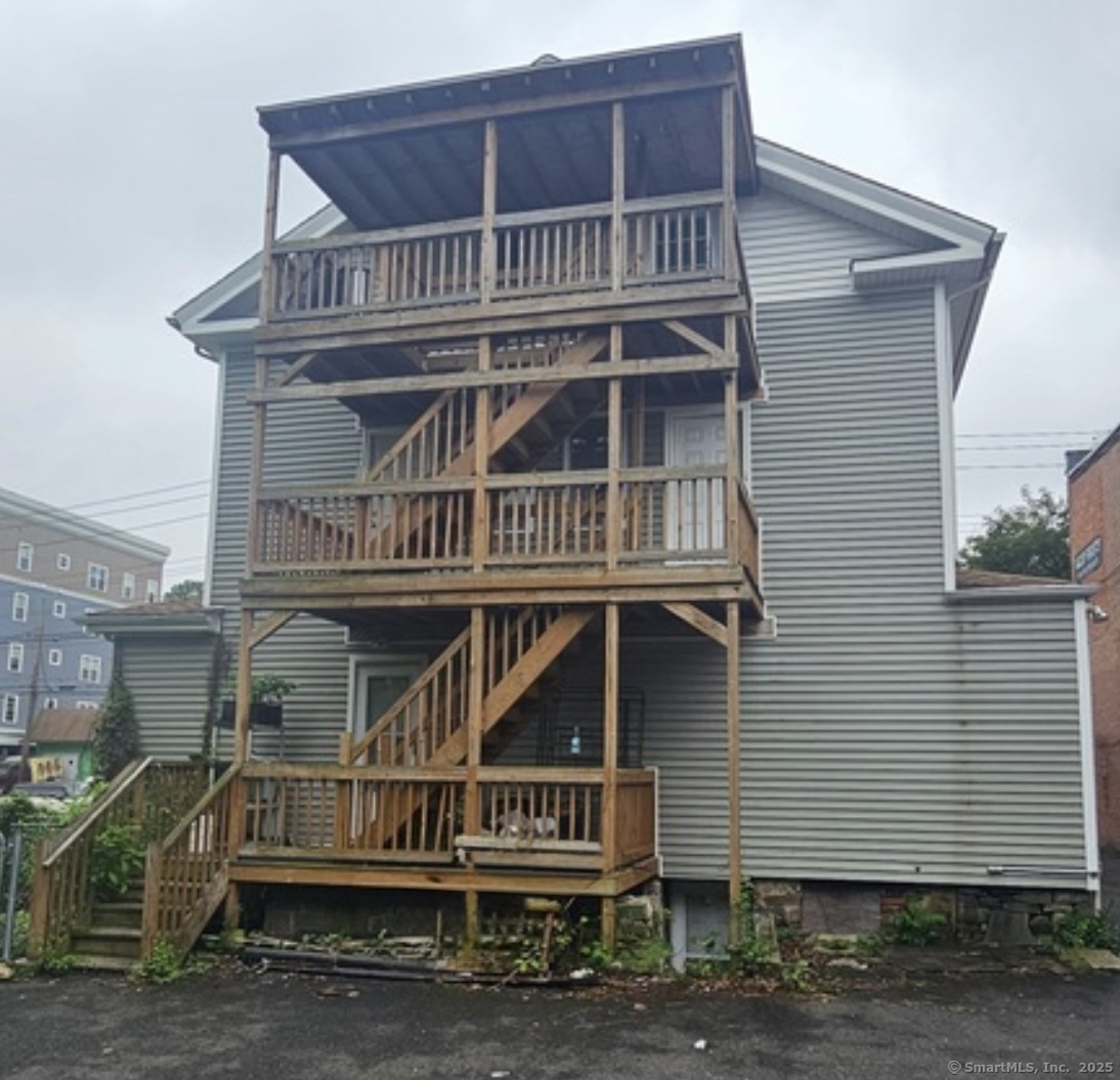 a front view of a house with a deck
