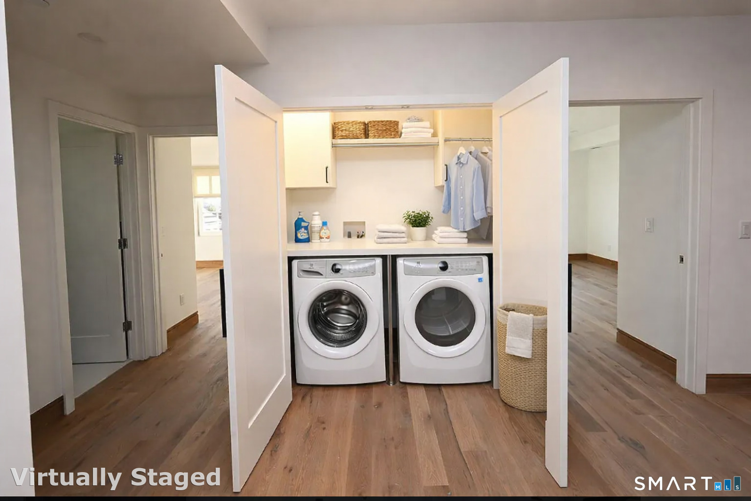 930 Cove Road, Unit 3 Stamford, CT 06902 - Photo 7 of 9 a view of a hallway with washer and dryer