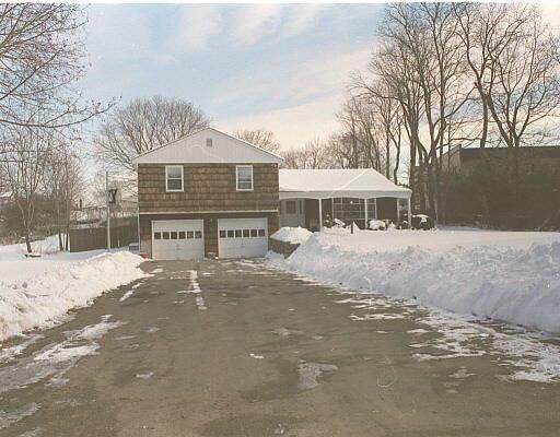 10 Shepard Road Danbury, CT 06810 - Photo 1 of 1 a view of house with a yard and covered with snow