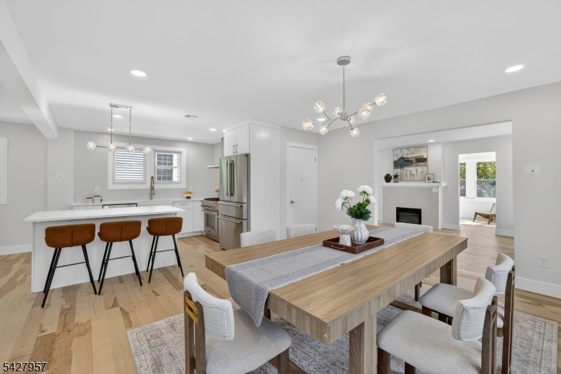 909 Ridgewood Road Millburn, NJ 07041 - Photo 10 of 33 a view of a dining room with furniture and wooden floor