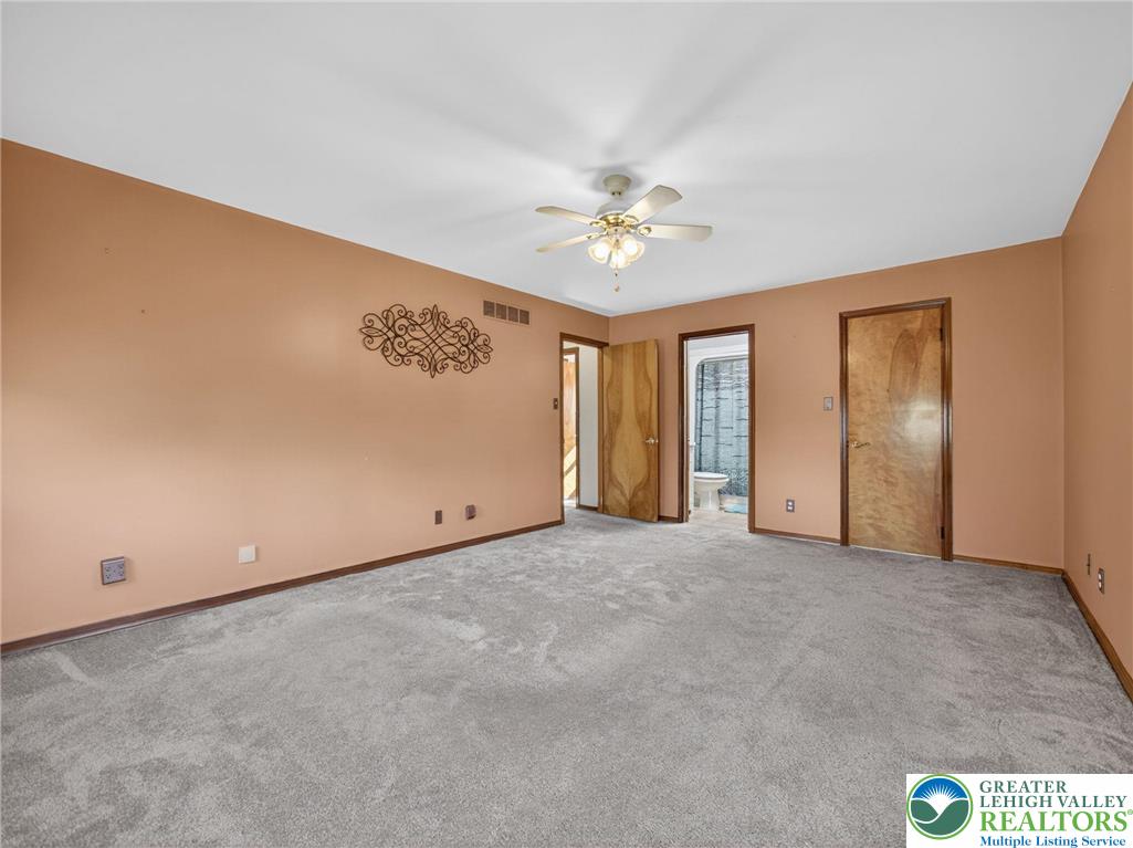 7098 Limerick Square Bath, PA 18014 - Photo 14 of 31 an empty room with windows and closet