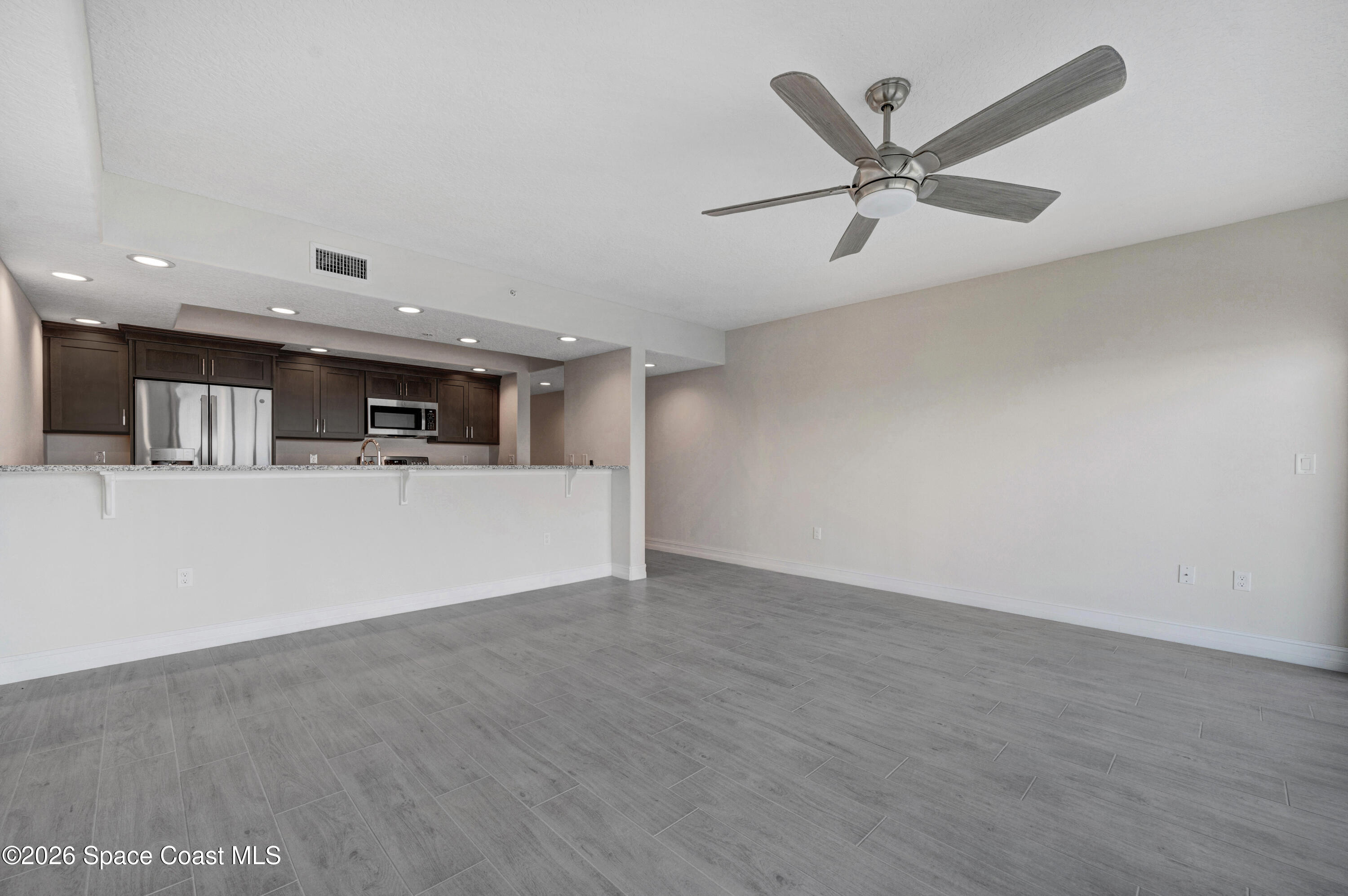 1805 Riverside Drive, Unit 304 Titusville, FL 32780 - Photo 30 of 46 a view of a kitchen with a sink and dishwasher